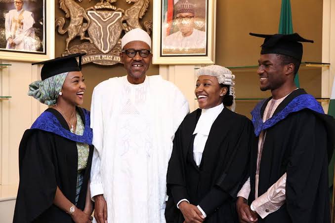 President Muhammadu Buhari on Thursday posed for photographs with three of his children who graduated from foreign universities